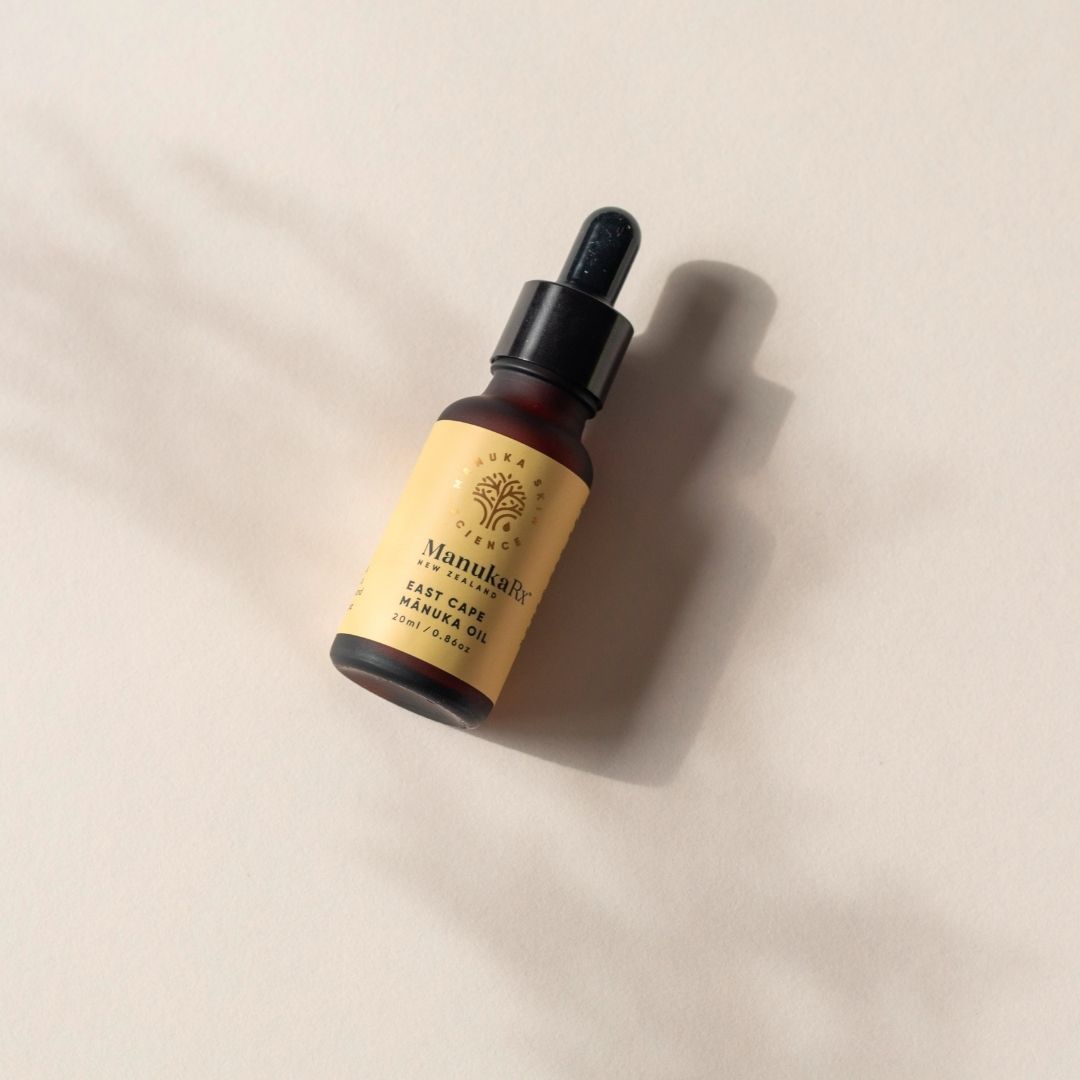 Bottle of ManukaRx East Cape Mānuka Skin Oil Blend on a cream coloured background