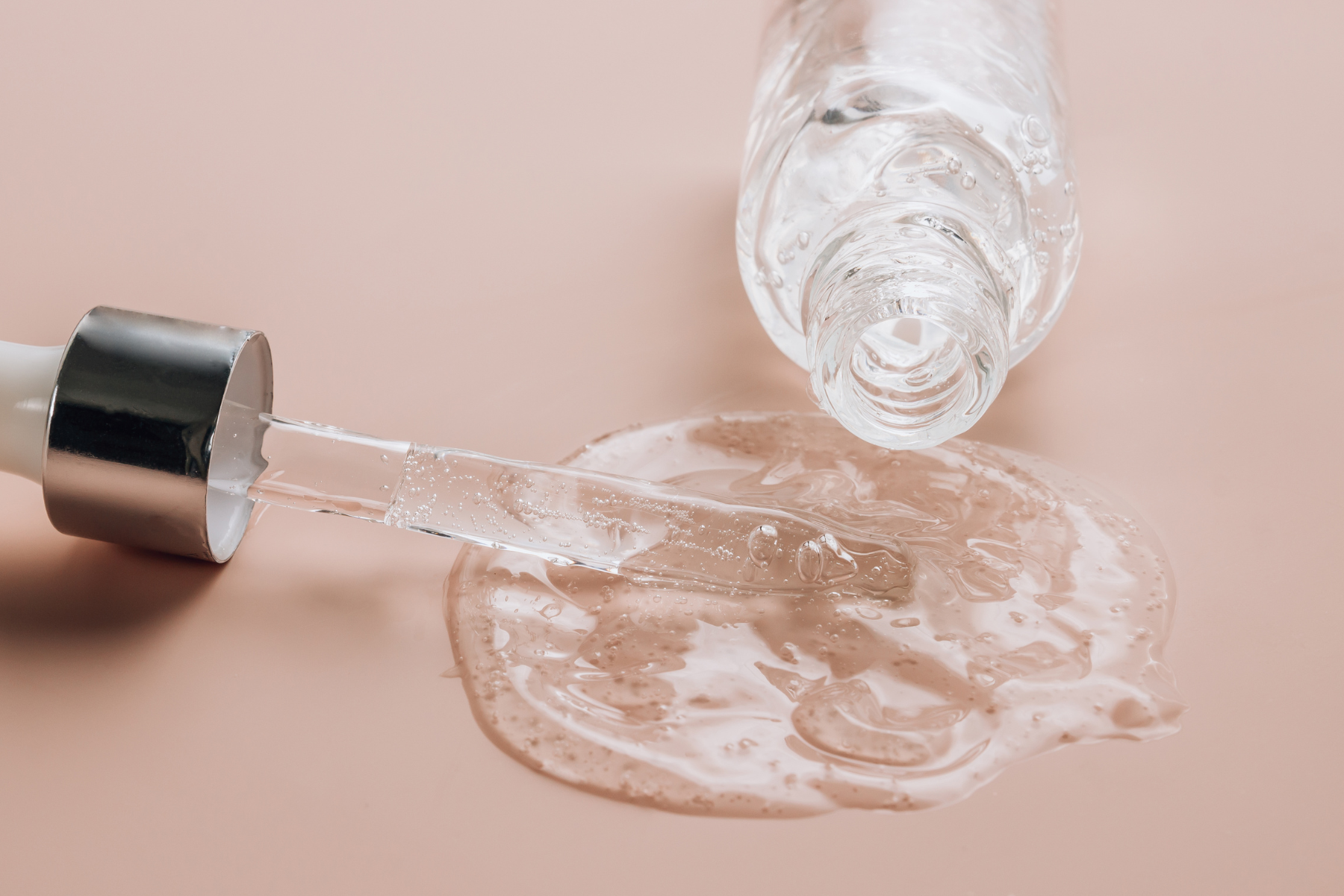 Bottle of salicylic acid spilling onto surface with dropper